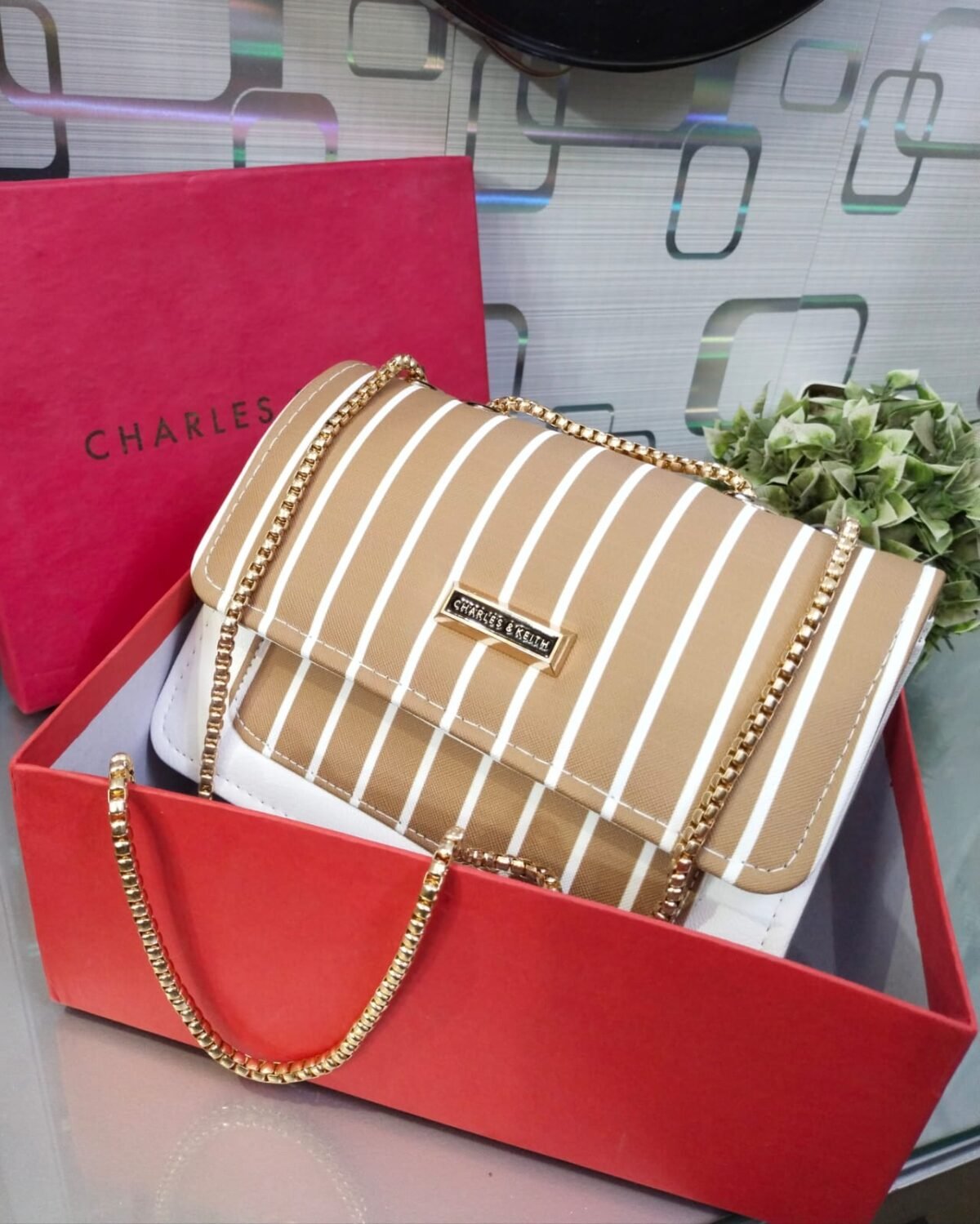 Striped Shoulder Bag with Gold Chain Detailing by Charles & Keith