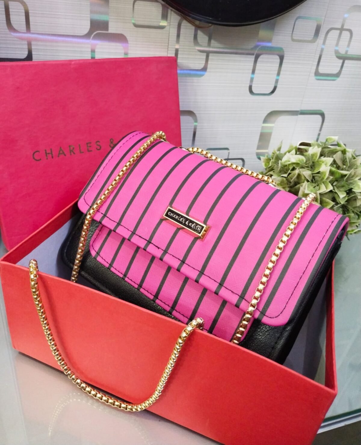Striped Shoulder Bag with Gold Chain Detailing by Charles & Keith