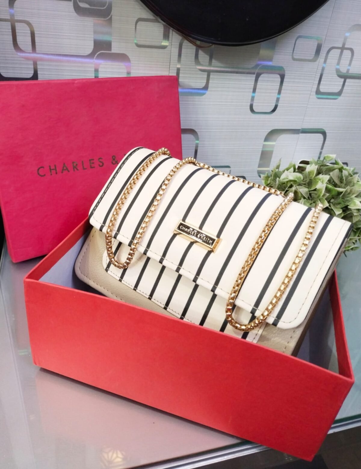 Striped Shoulder Bag with Gold Chain Detailing by Charles & Keith