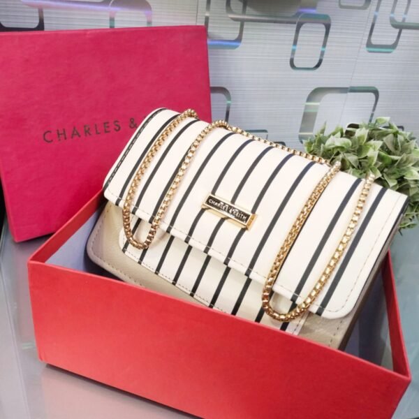Striped Shoulder Bag with Gold Chain Detailing by Charles & Keith